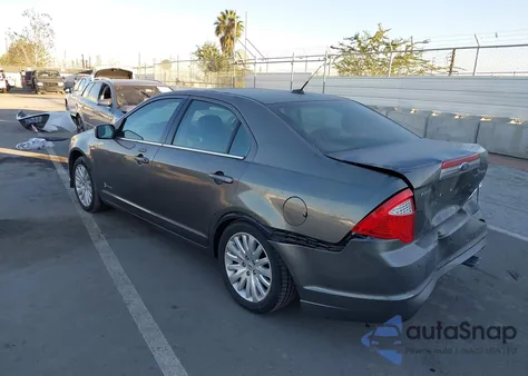 2011 Ford Fusion Hybrid z USA, uszkodzony, nr VIN 3FADP0L30BR342902